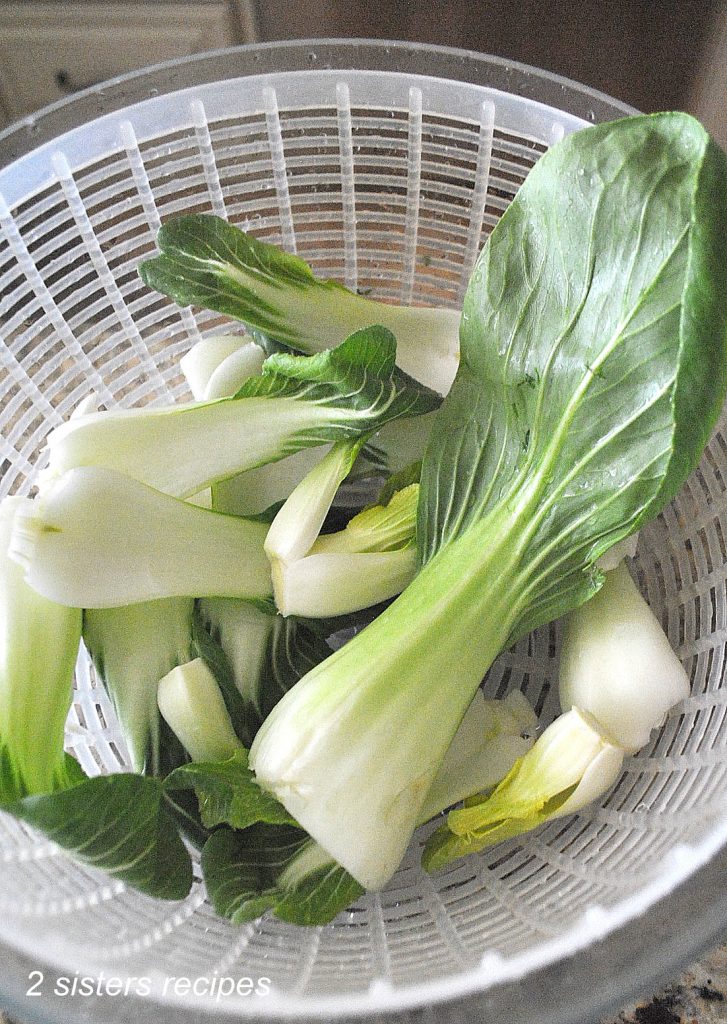 Fresh bok choy in a salad spinner. by 2sistersrecipes.com 