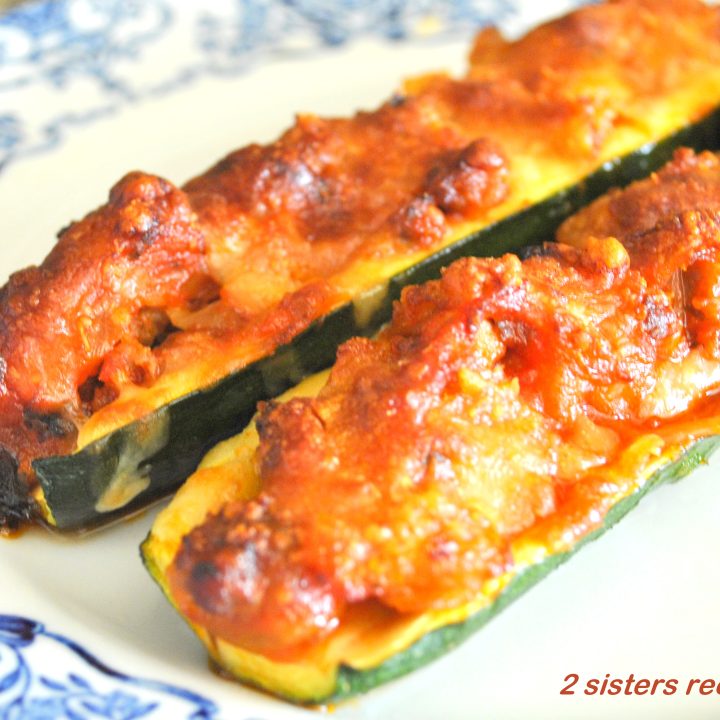 Zucchini Stuffed with Sausage Ragu and Cheese by 2sistersrecipes.com