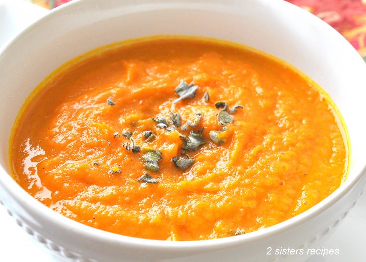 Curried Carrot Sweet Potato Ginger Soup by 2sistersecipes.com