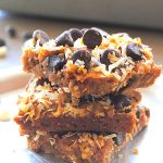 Gluten-Free Pumpkin Magic Bars piled on top of one another.