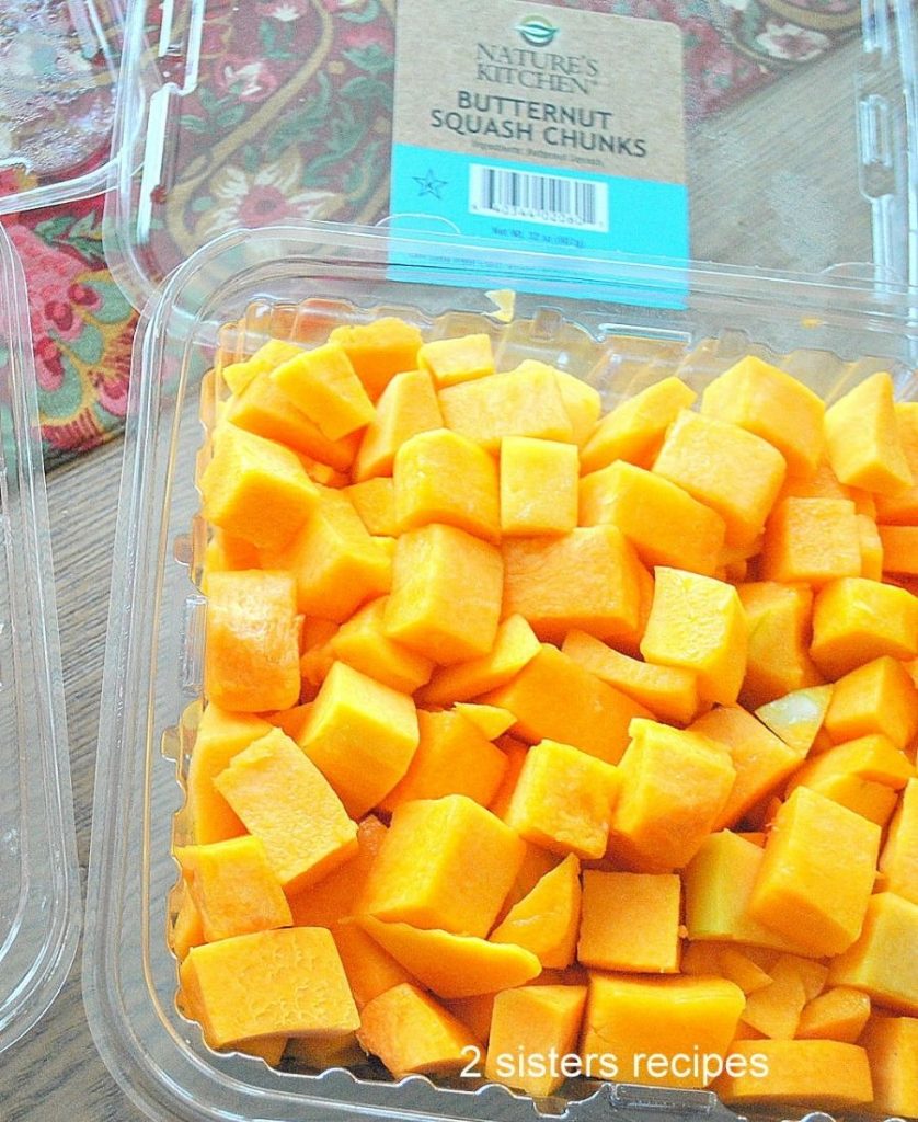A plastic container of chopped squash. by 2sistersrecipes.com.