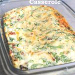 A baked Spinach and Egg Breakfast Casserole served in a glass baking dish.
