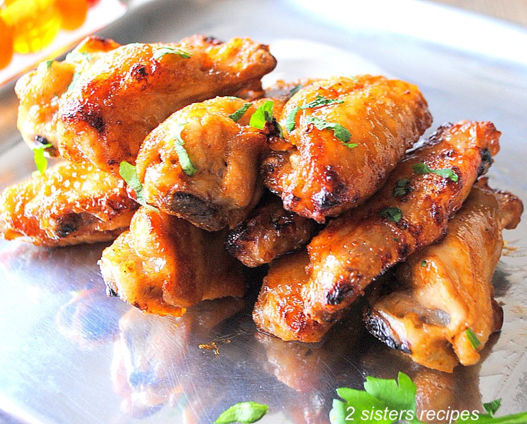 Roasted Spicy Maple Chicken Wings by 2sistersrecipes.com