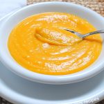 A spoonful of butternut squash soup. by 2sistersrecipes.com