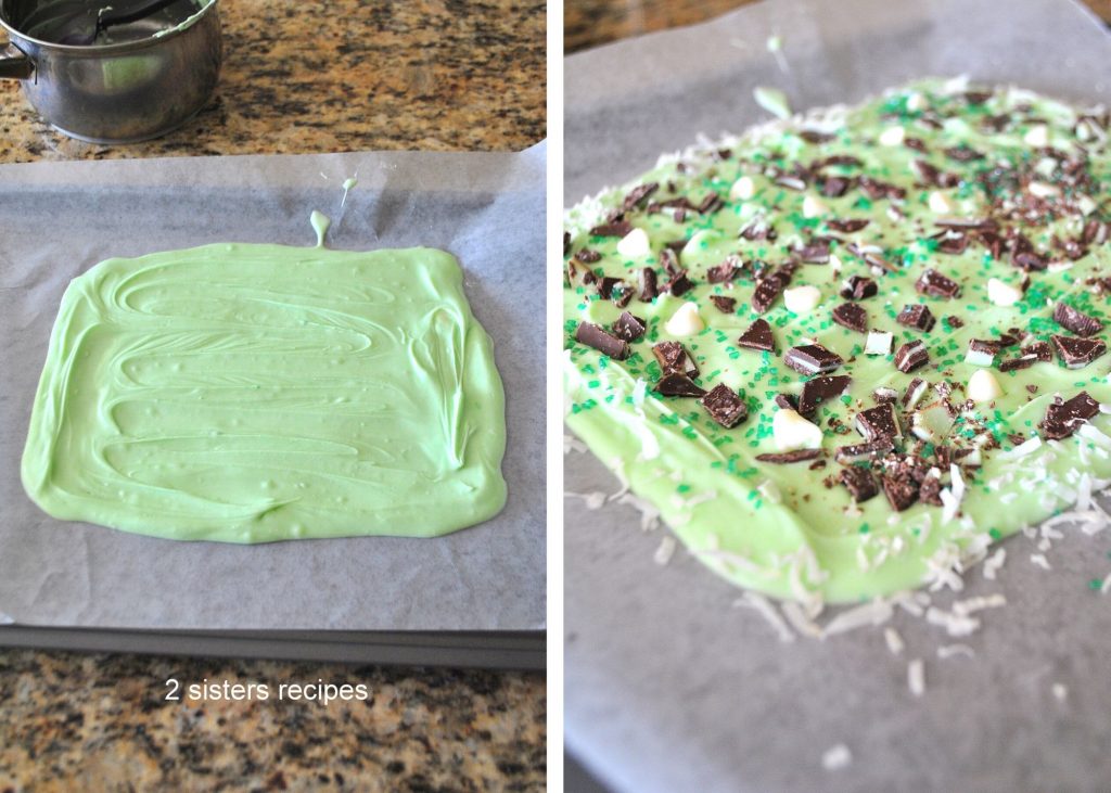 Green Chocolate Bark cooling on parchmenet paper, then topped with shredd coconut and mint chocolate bits. by 2sistersrecipes.com