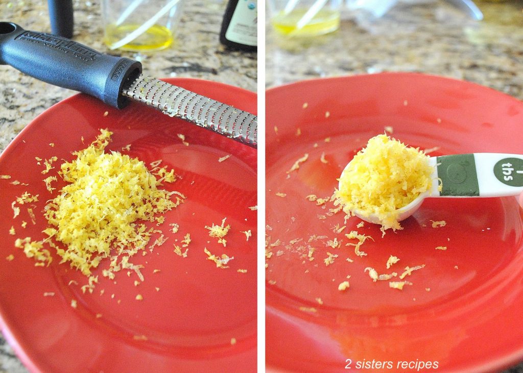 A red plate with lemon zest on it and in a measuring spoon.