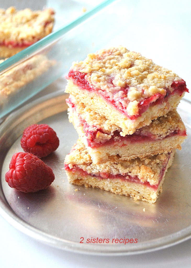 Raspberry Lemon Crumble Bars by 2sistersrecipes.com