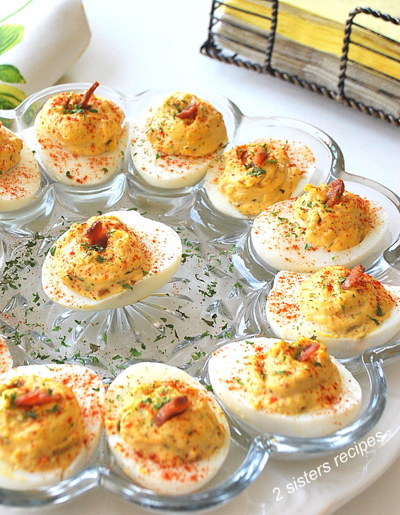 a round dish filled with deviled eggs for an easy Easter dinner recipe.