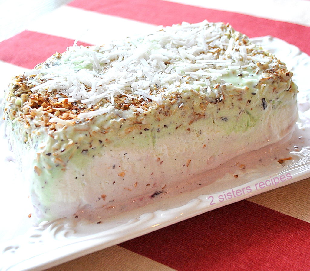 Easy Spumoni Ice Cream cake served on a rectangular dish . 
