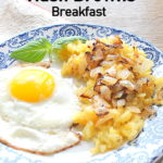 A Hash Browns Breakfast served with an cooked egg on a blue and white plate.