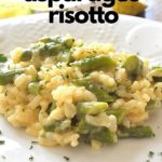 A white plate filled with cooked rice and chopped asparagus.