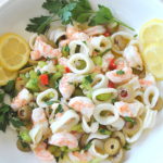 A seafood salad made with shrimp and calamari tossed with lemon dressing and fresh parsely.