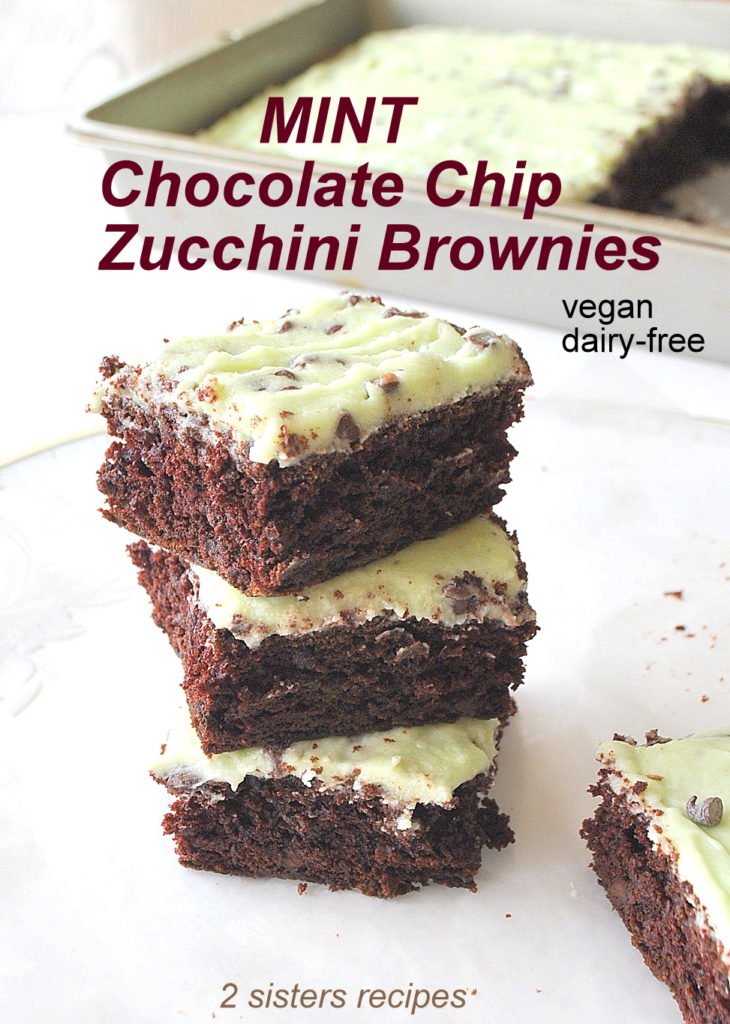  A pile of chocolate brownies with a mint frosting on top. 