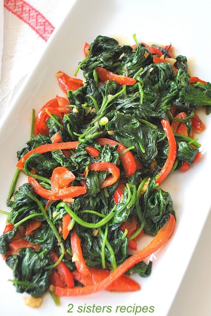 A platter with spinach and peppers. by 2sistersrecipes.com 
