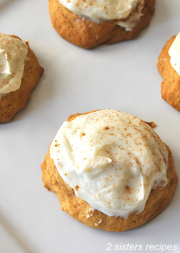 upclose photo of a cookies with Vanilla Cream Ch eese Frosting by 2sistersrecipes.com