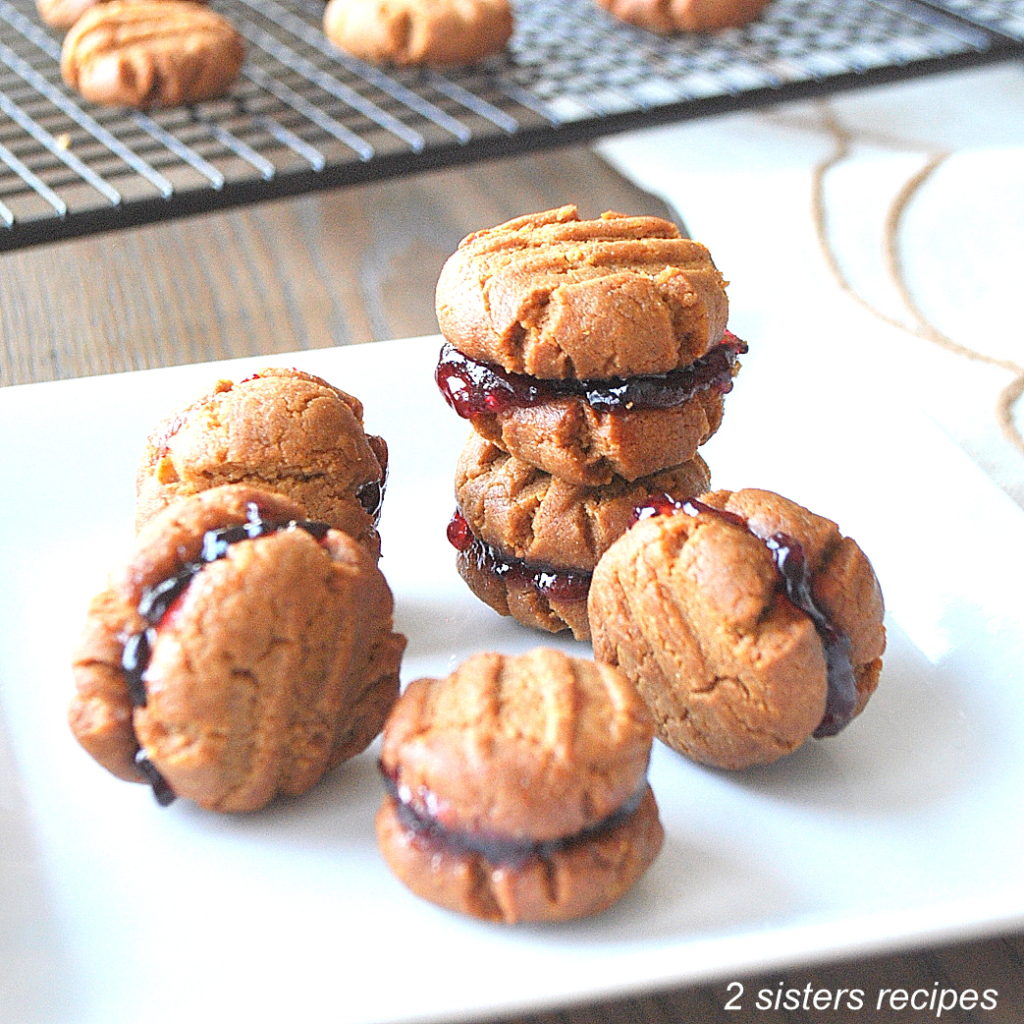 5-Ingredient Peanut Butter and Jelly Sandwich Cookies by 2sistersrecipes.co  