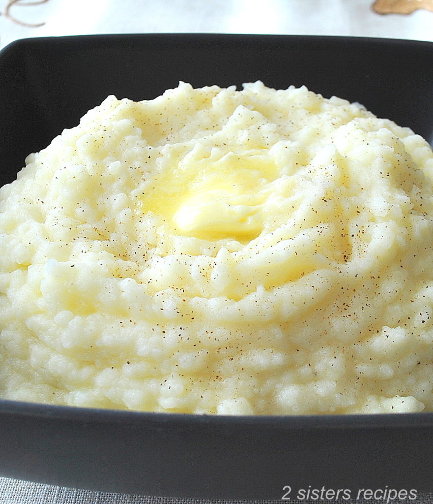 Best Creamy Mashed Potatoes by 2sistersrecipes.com