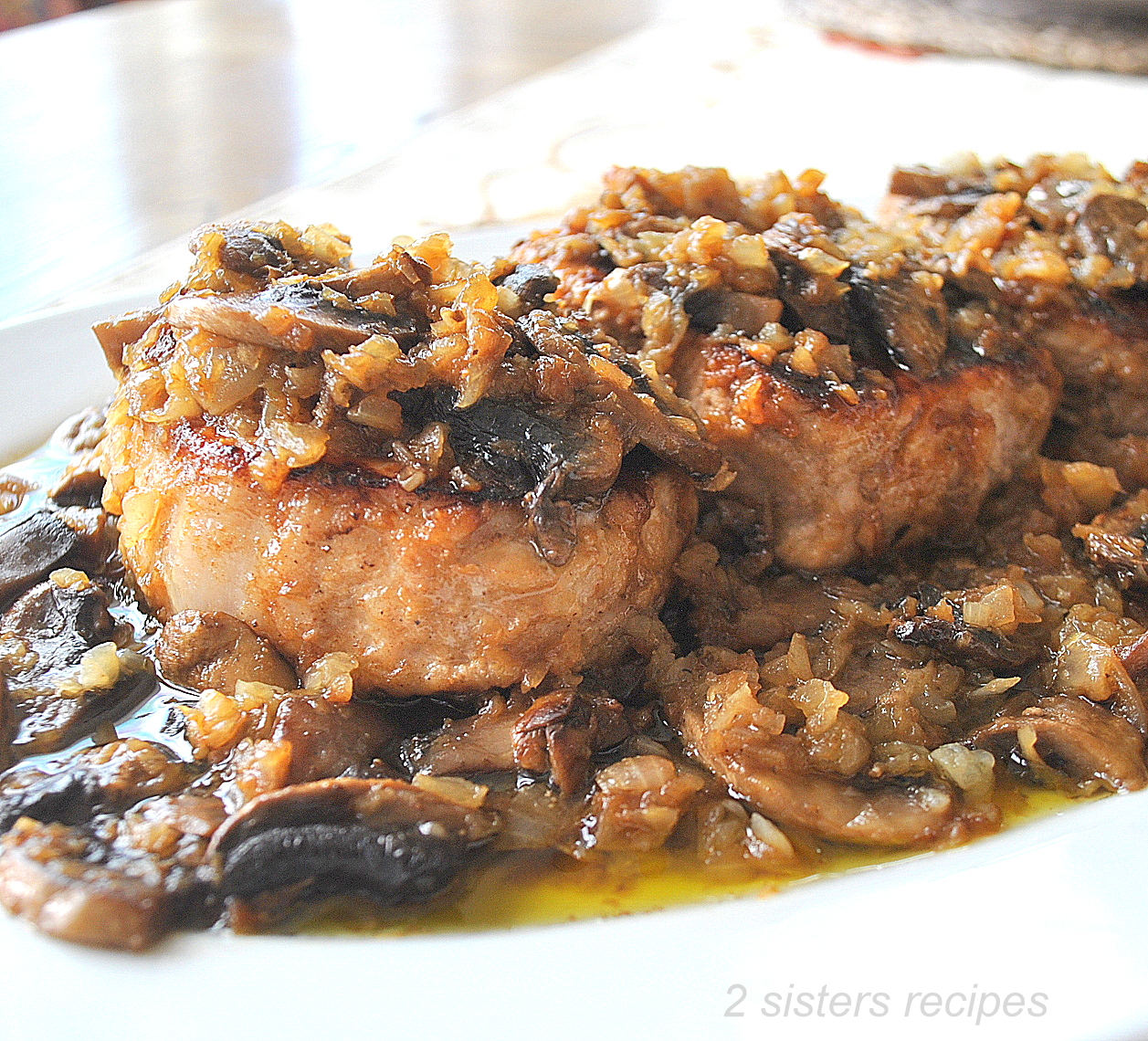 Classic Pork Chop Marsala by 2sistersrecipes.com