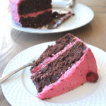 Cranberry Buttercream Chocolate Cake served on a white plate