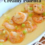 Baking dish with shrimp served over creamy polenta.