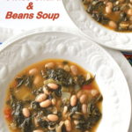 2 white bowls filled with a soup loaded with white beans and Swiss Chard.