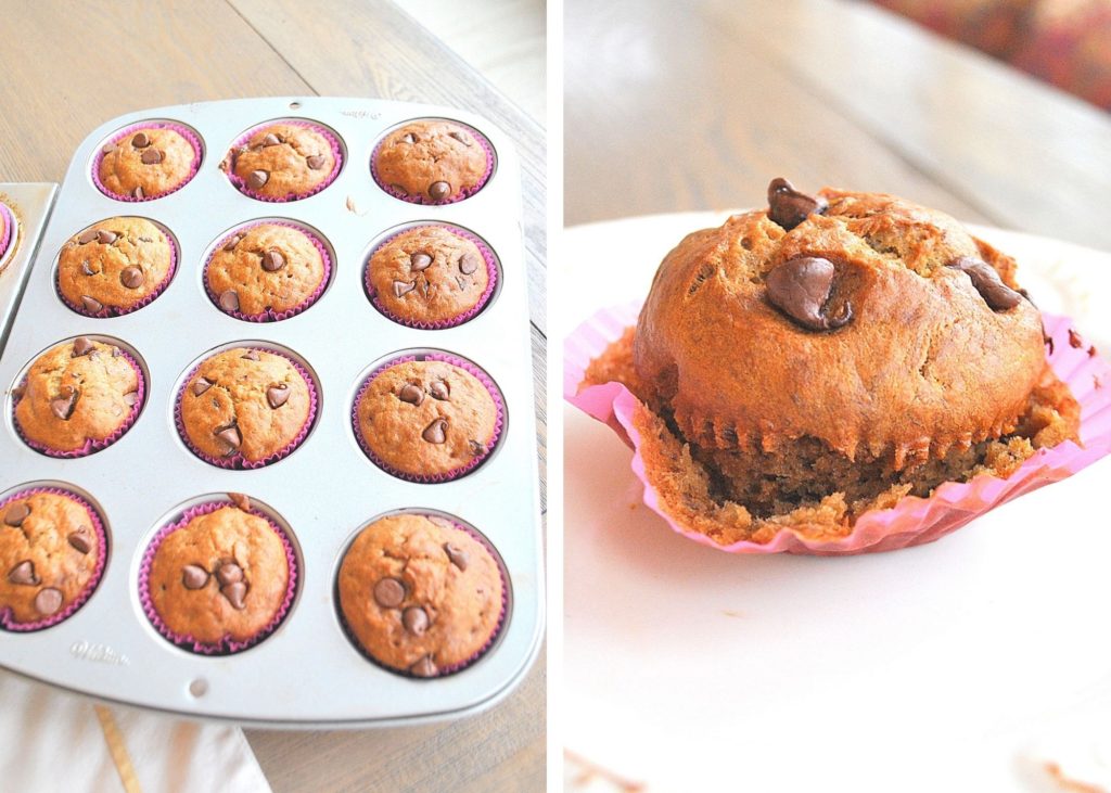 One muffin pan with baked muffins and one muffin with the paper peeled back on a white plate.  by 2sistersrecipes.com