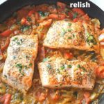 Pan-Seared Salmon with Relish served in a black skillet.