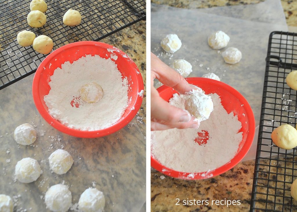 Cookies are rolled in powdered sugar. by 2sistersrecipes.com 