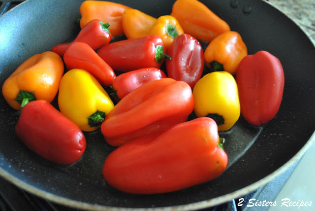 mixed colorful peppers in a large skillet. by 2sistersrecipes.com