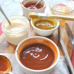 Five small ramekin bowls of each sauce.