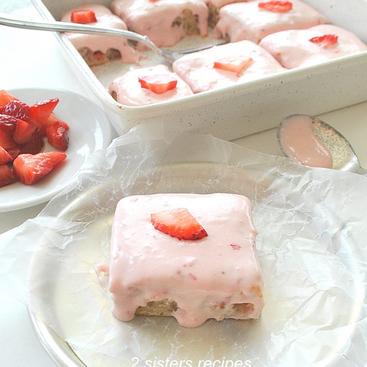 A piece of snack cake on a small plate.