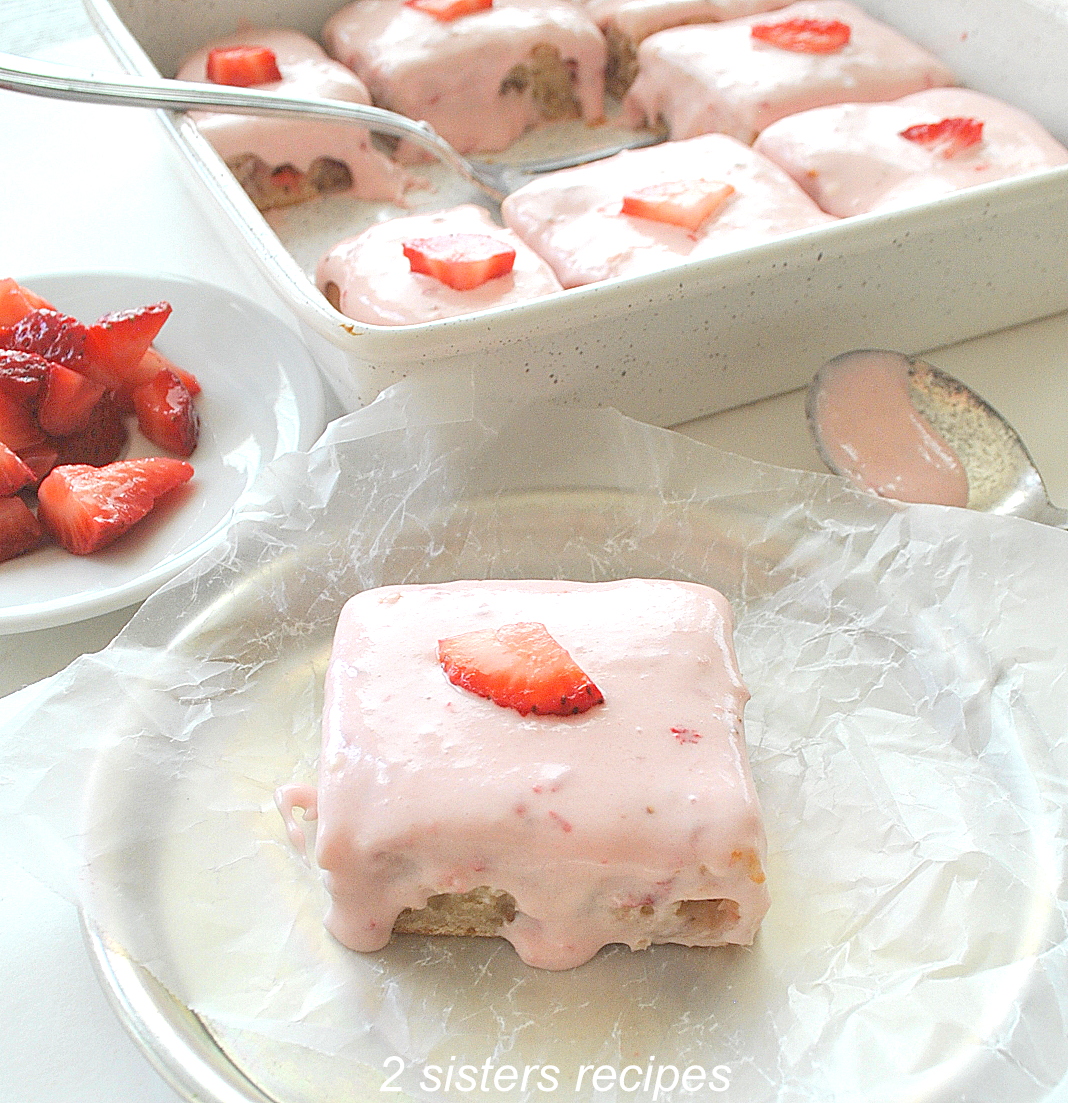 A piece of snack cake on a small plate. by 2sistersrecipes.com