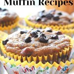 A baked pumpkin muffin with chocolate chips on top.