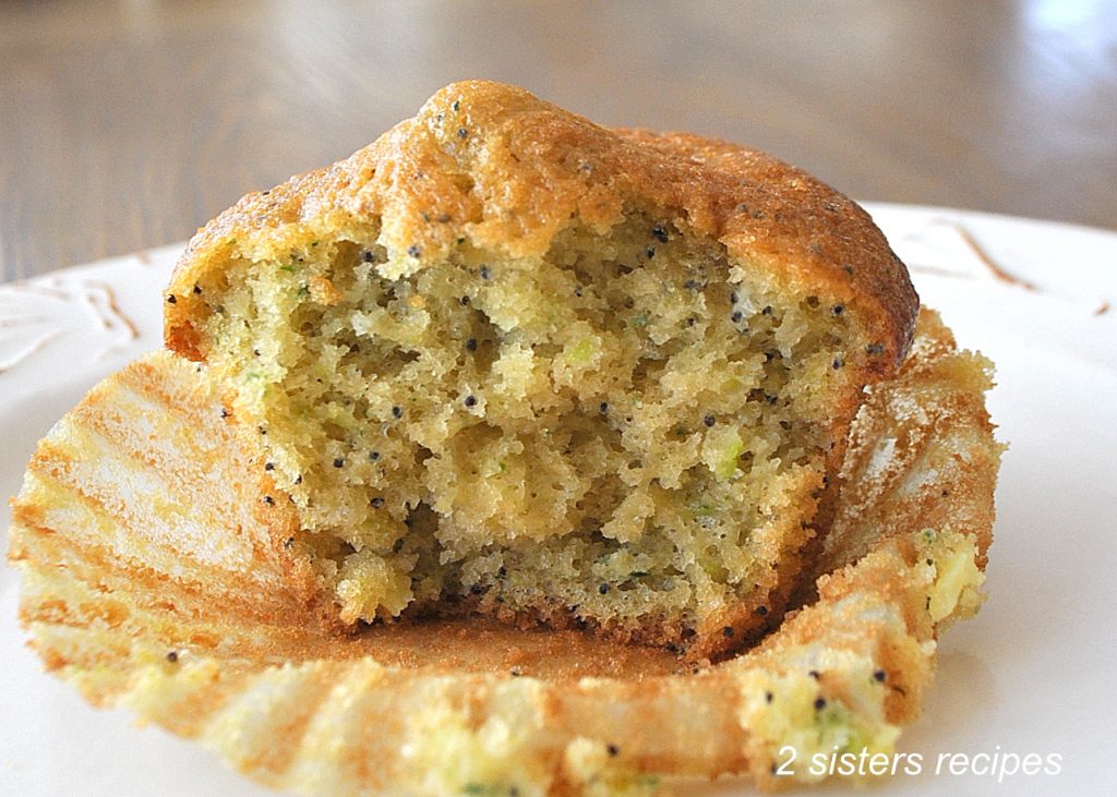 Lemon Zucchini Poppy Seed Muffins by 2sistersrecipes.com