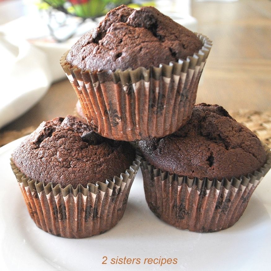 Death by Chocolate Zucchini Muffins by 2sistersrecipes.com