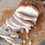 Full view of carved turkey breast on cutting board. by 2sistersrecipes.com