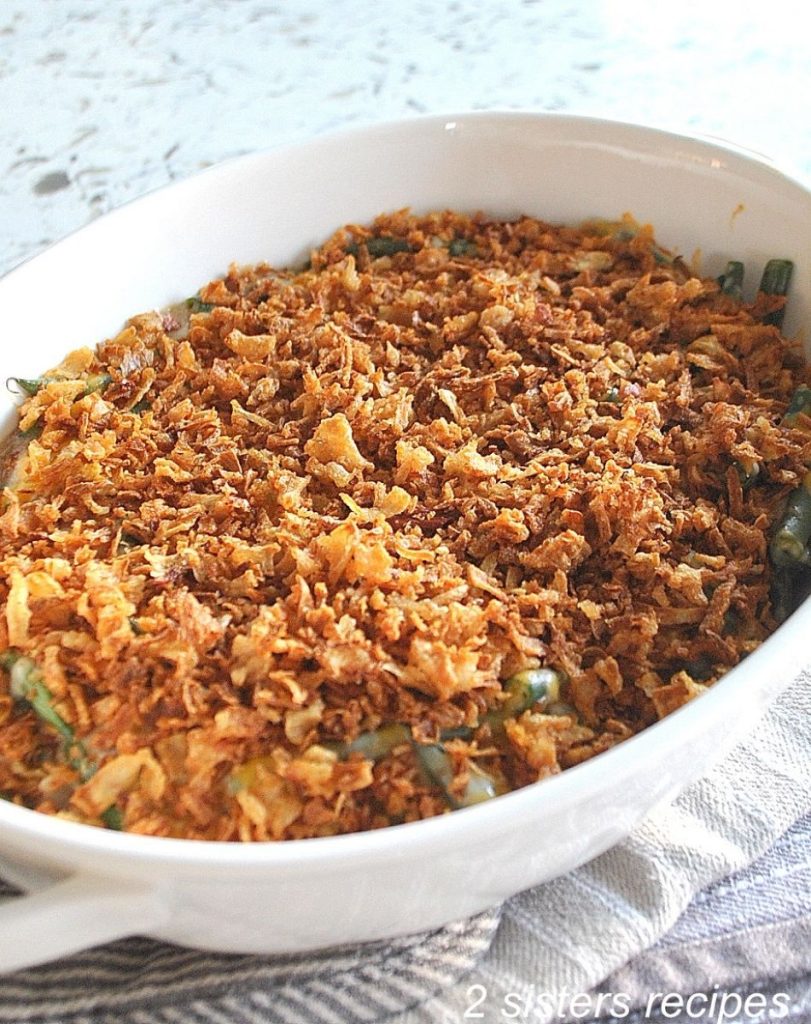 A layer of fried onions on green bean mixture. by 2sistersrecipes.com 
