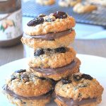 Four cookies piled on top of each other. by 2sistersrecipes.com