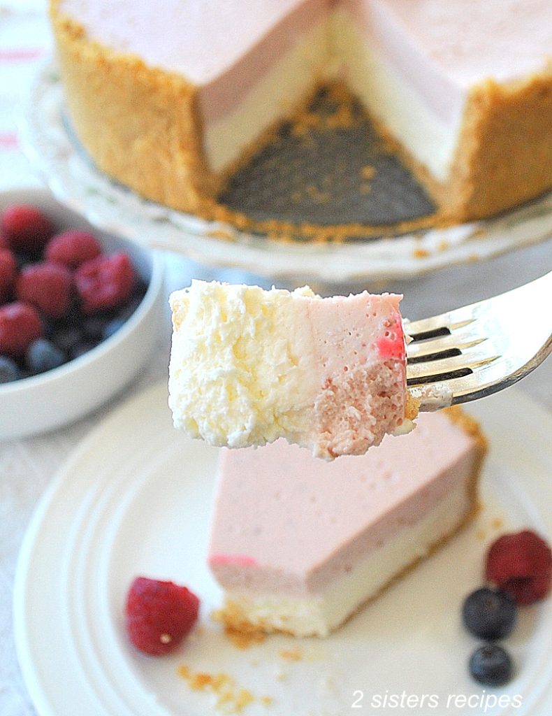 A forkful of cheesecake. by 2sistersrecipes.com