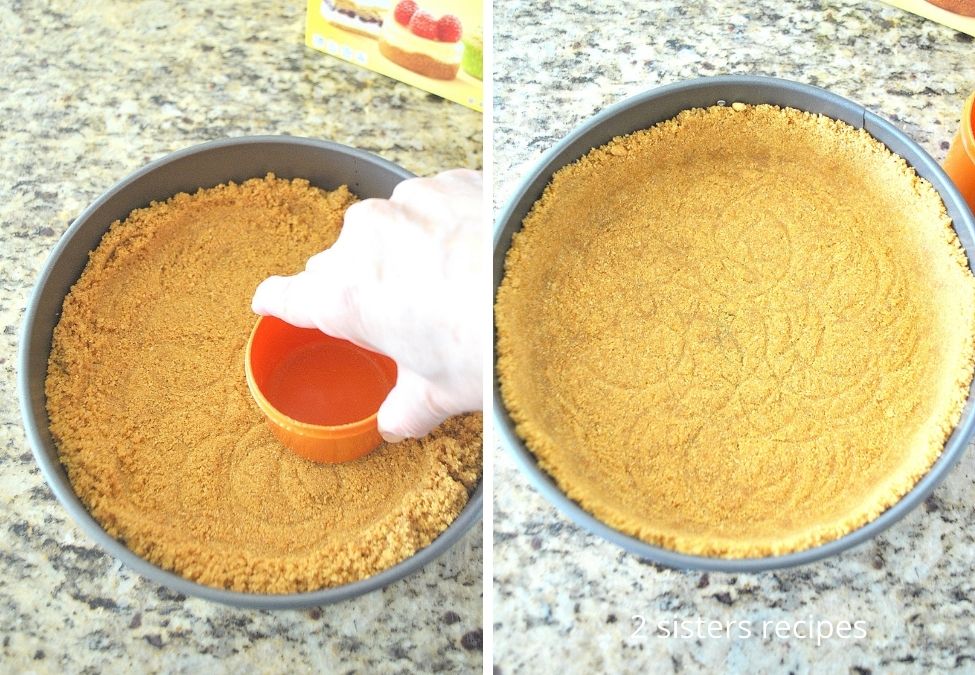 Pressing crumbs on the bottom of a springform pan. by 2sistersrecipes.com