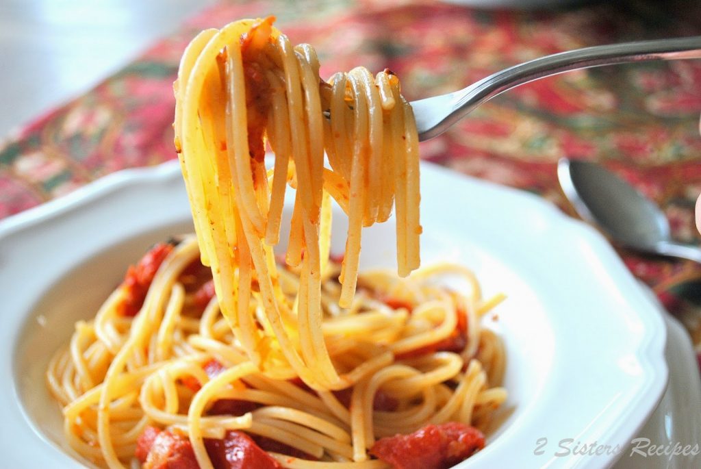 A forkful of Spaghetti with Oven Roasted Tomatoes Sauce.