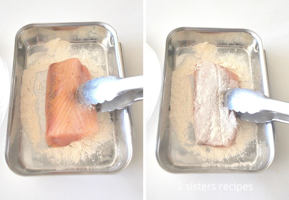 Dreging the mahi in flour and coating both sides. by 2sistersrecipes.com