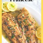 Filet of Sole Francese served on a white plate with lemon sauce.