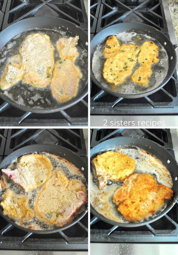 Frying the pork chops Milanese in a black skillet on stovetop by 2sistersrecipes.com