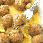 A white baking dish filled with Turkey Meatballs with Lemon Sauce