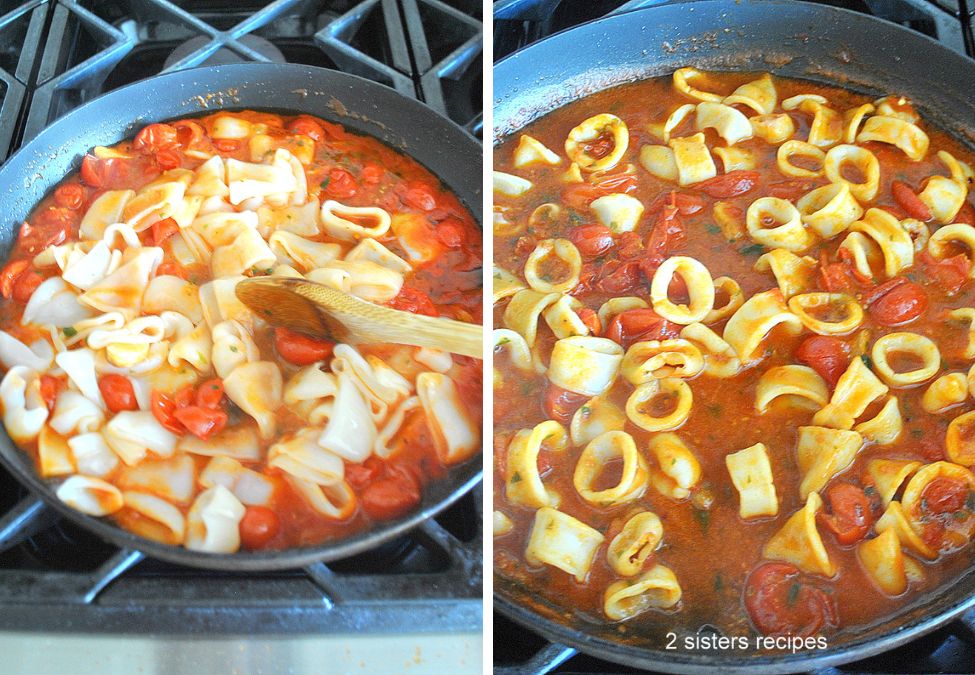 Large skillet simmering the calamari in tomato sauce. by 2sistersrecipes.com