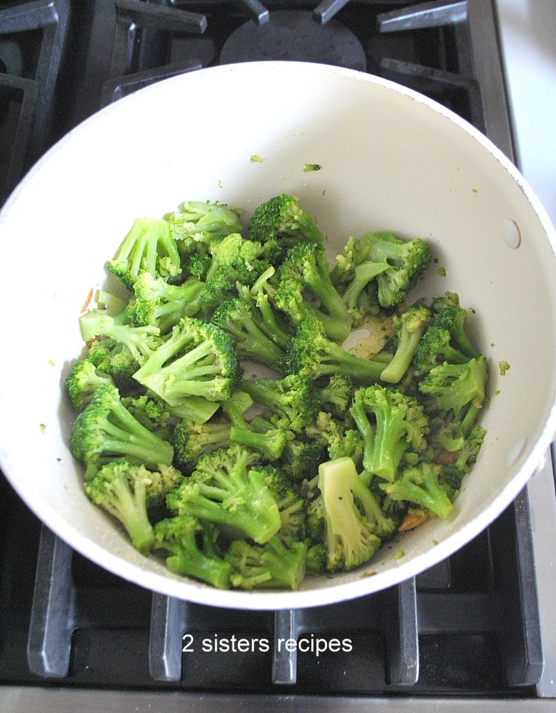 Broccoli florets are add into the pot. by 2sistersrecipes.com