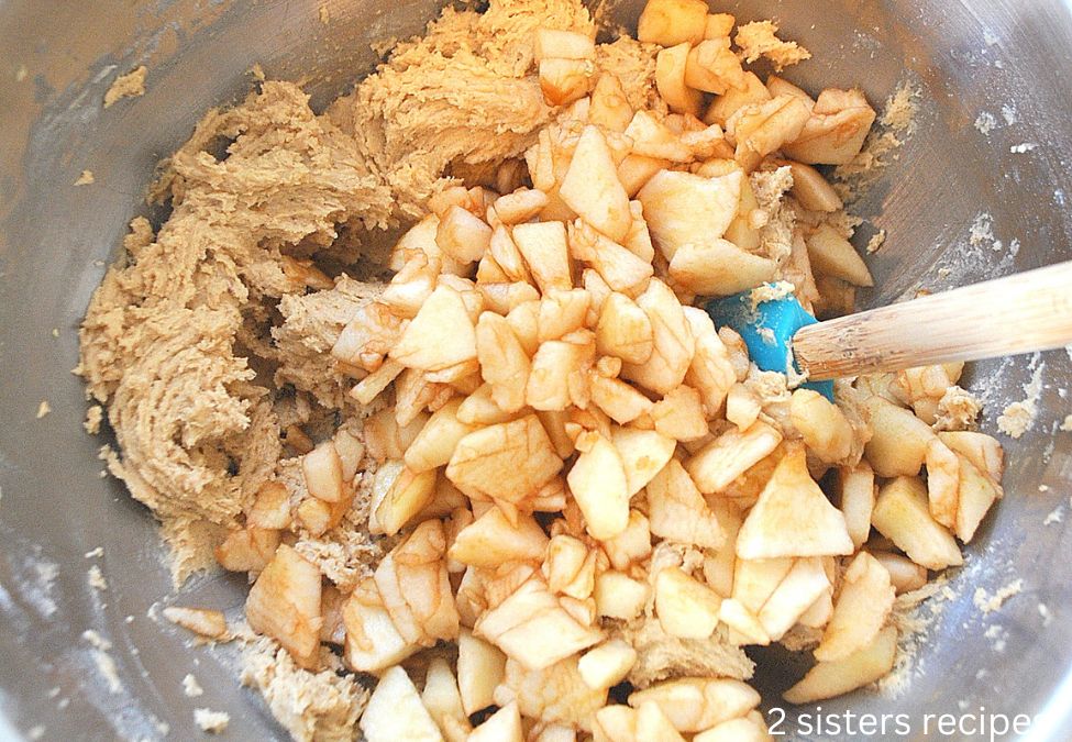  Diced apples are tossed into the mixture. by 2sistersrecipes.com
