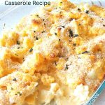 A glass baking dish filled with baked cauliflower with cream sauce on top.