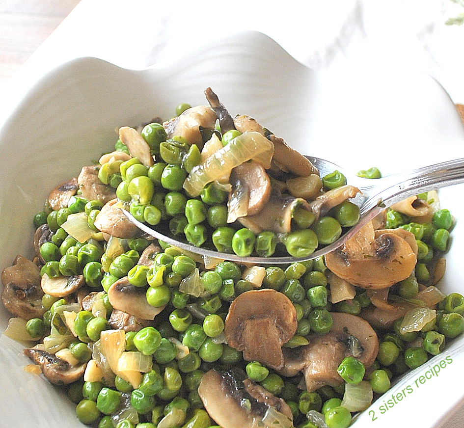 A spoonful of peas and mushrooms. by 2sistersrecipes.com